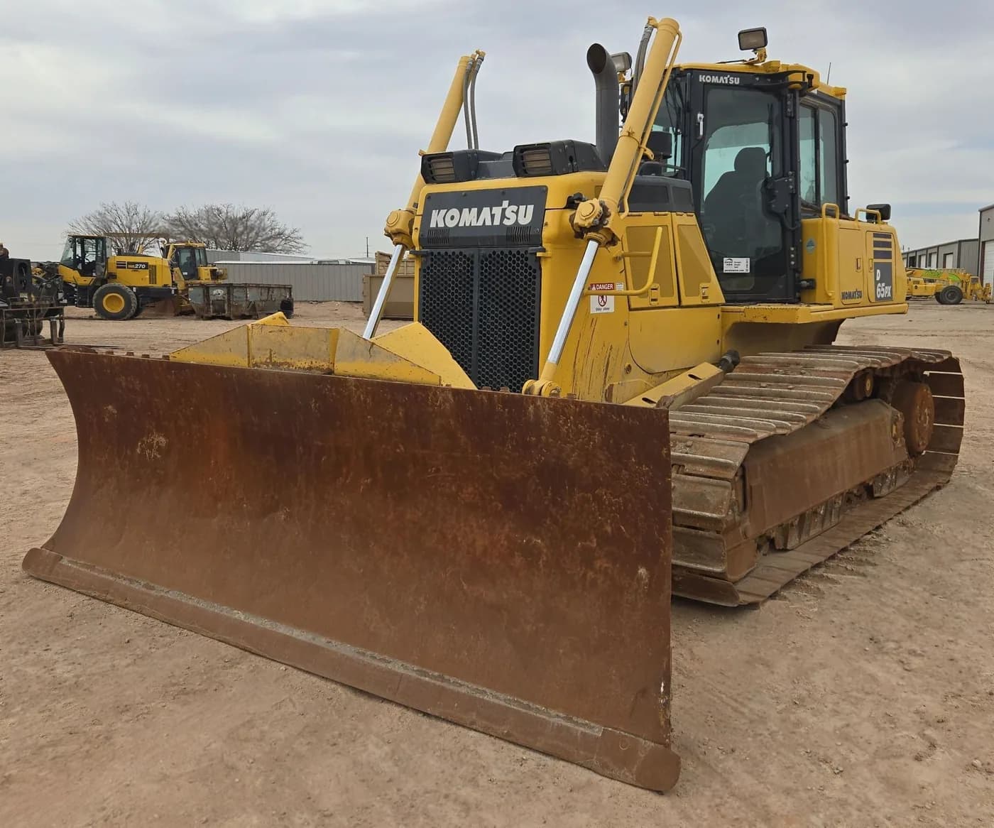 Komatsu D65PX-18 dozer standing on the yard