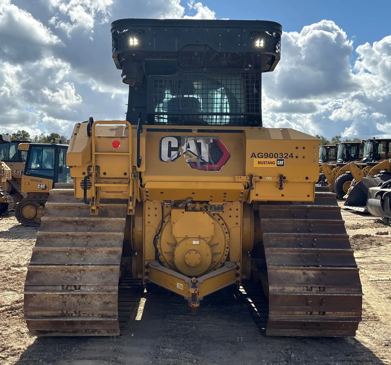 Caterpillar D6 LGP dozer listed by Heavy Duty Export, with further machines standing behind it